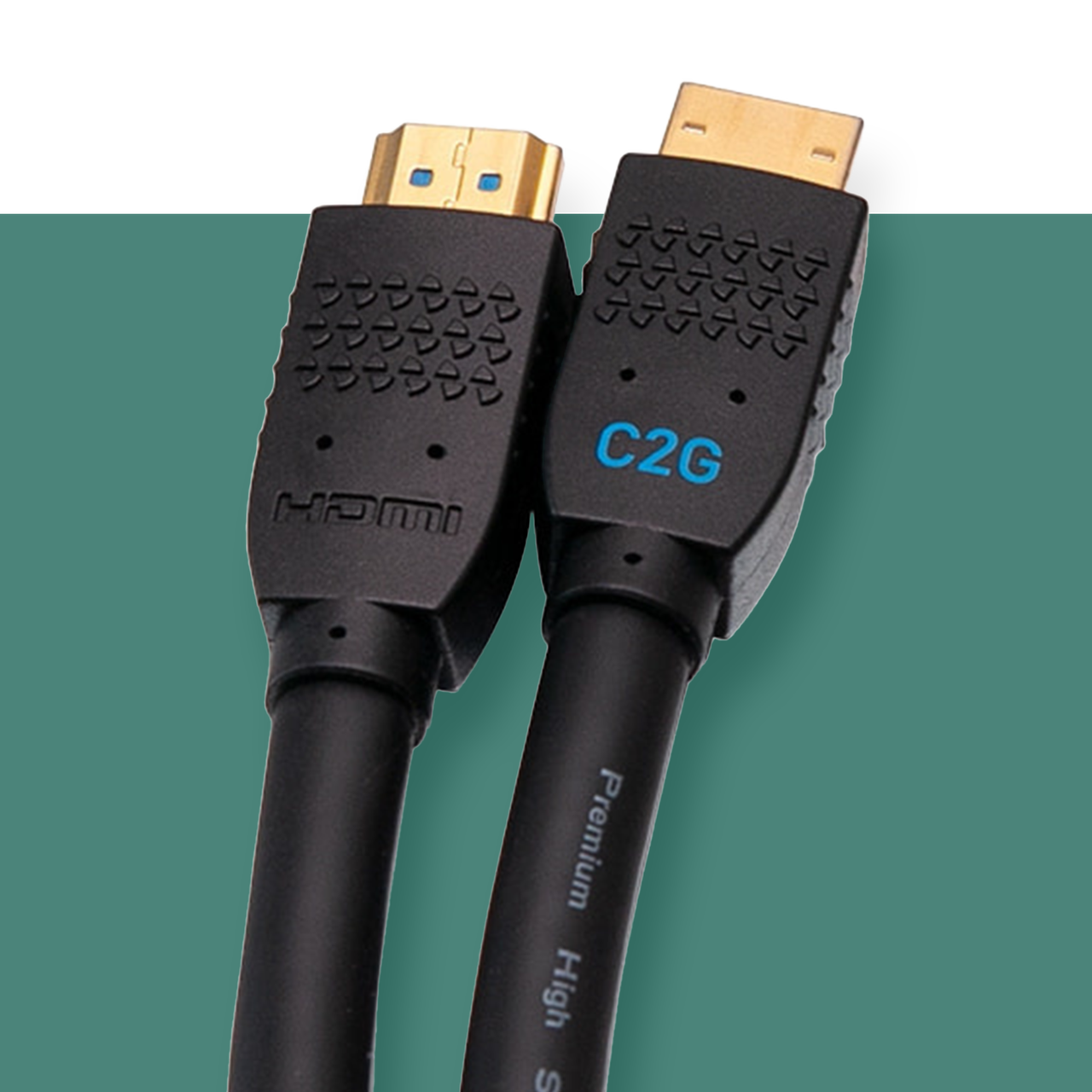 Two C2G HDMI cables on a green background
